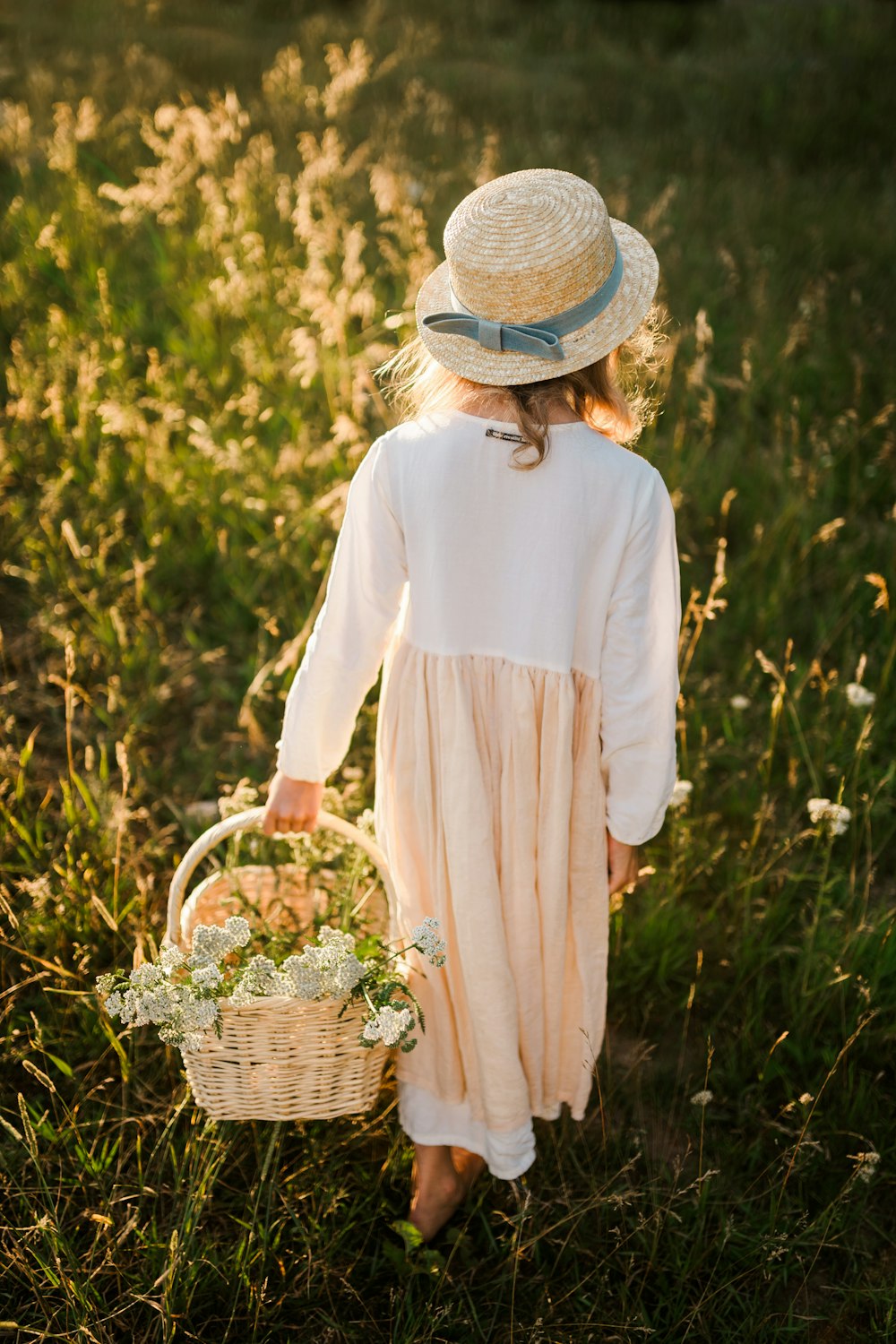 a man holding a basket of flowers