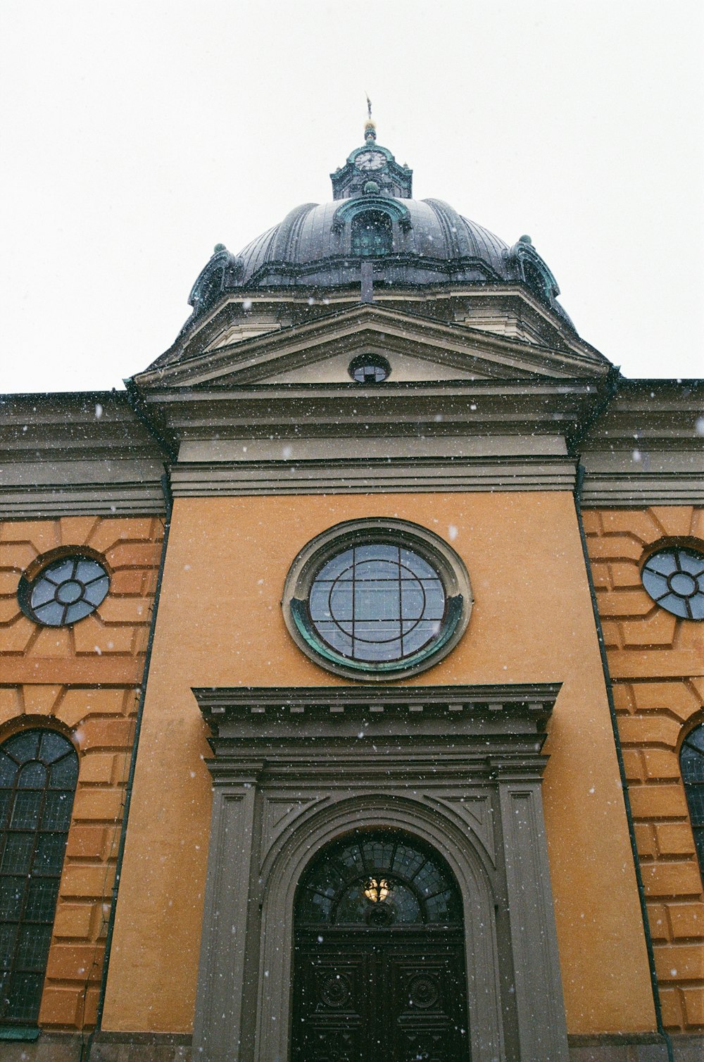 a building with a clock on the front