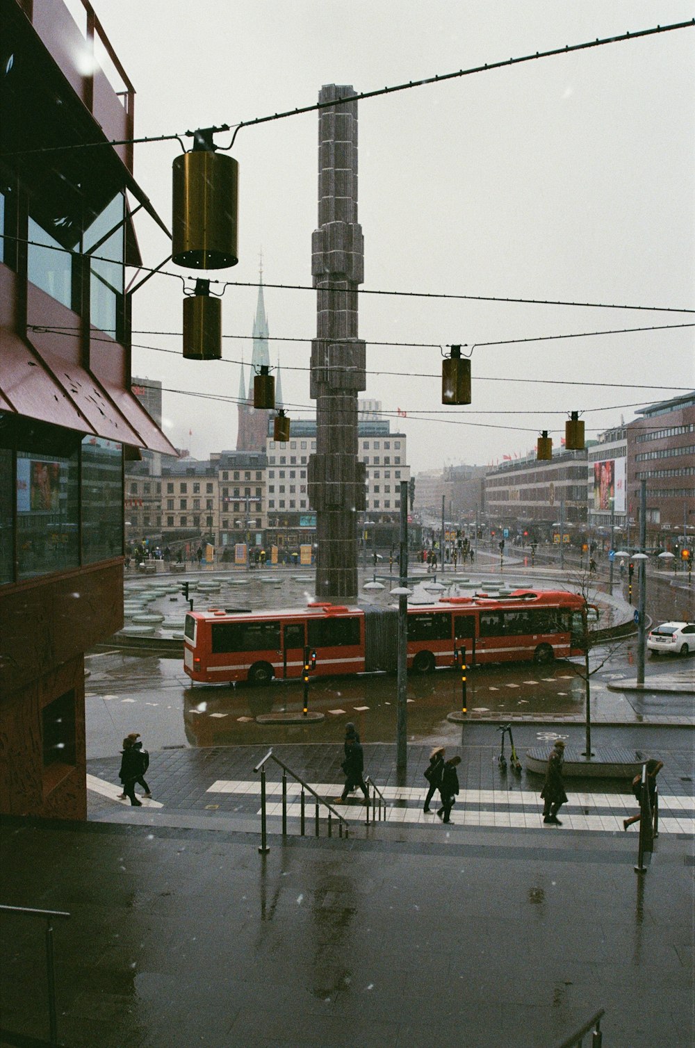 a bus driving through a city