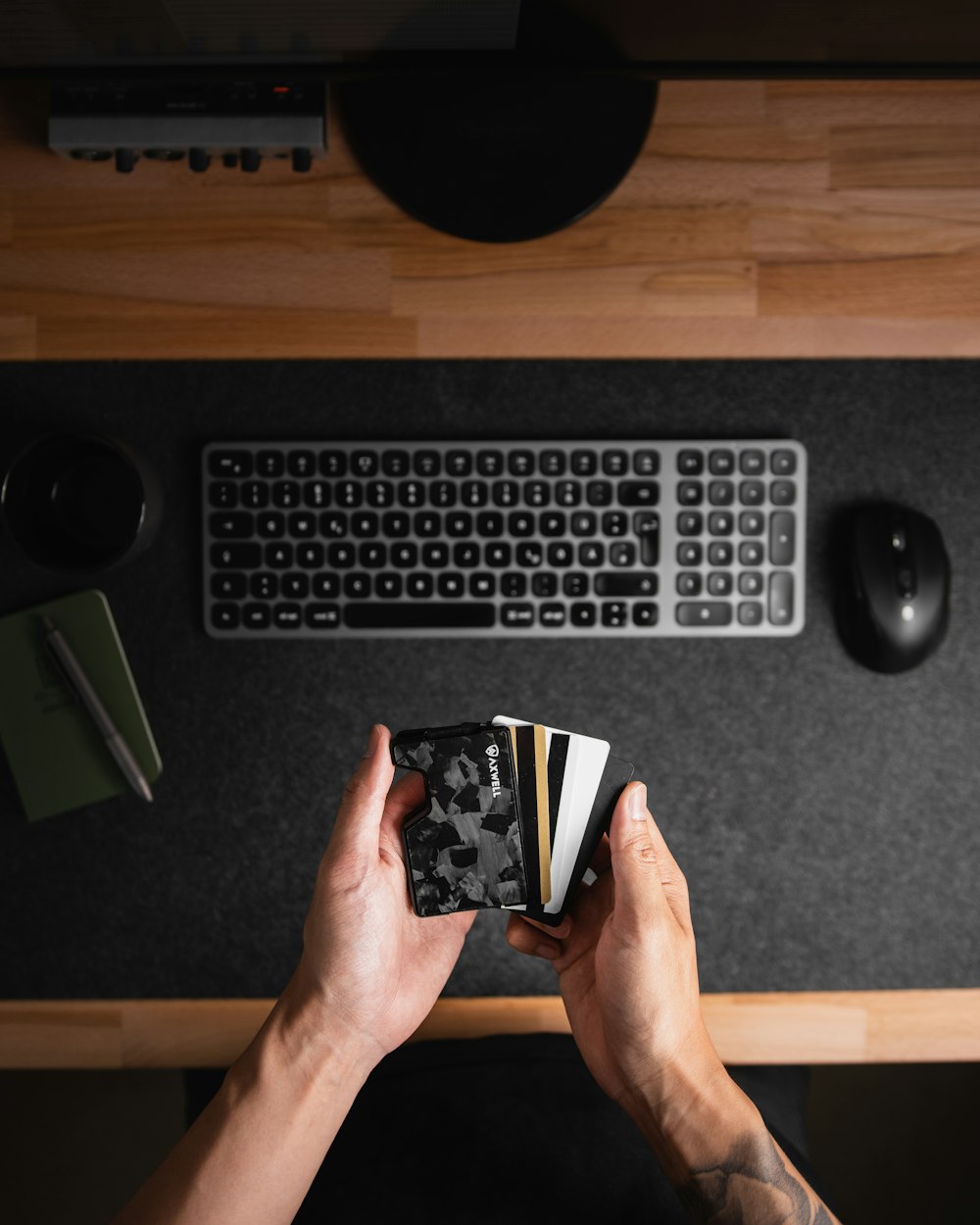 a person holding a small electronic device