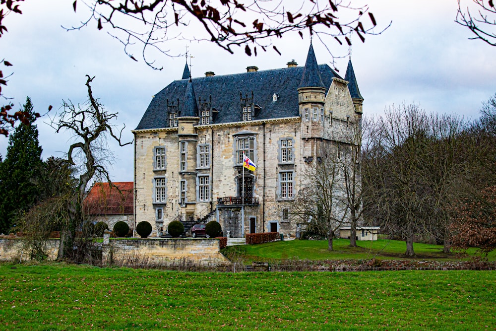 a large building with a flag on top