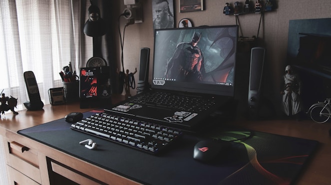 a laptop sits on top of a desk