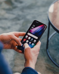 a person holding a cell phone