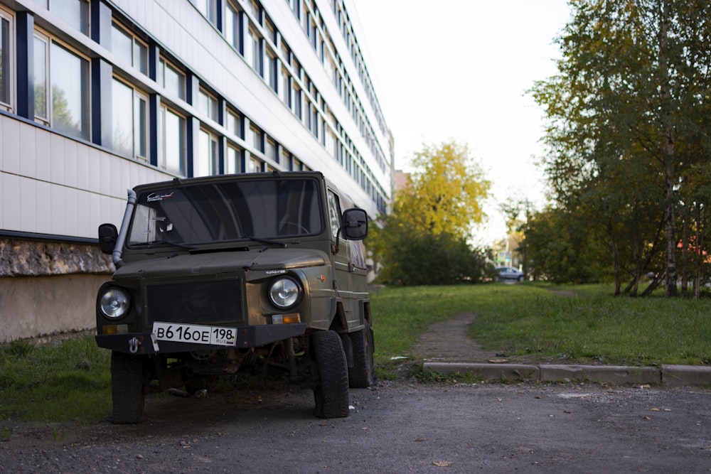 a jeep parked on the side of a road