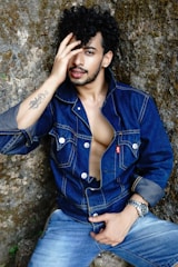 a person sitting on a rock