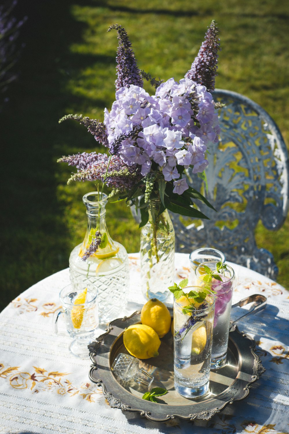 a vase with purple flowers