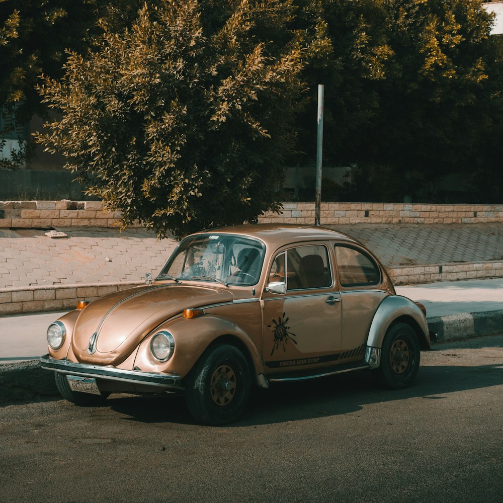 an old car parked on the side of the road