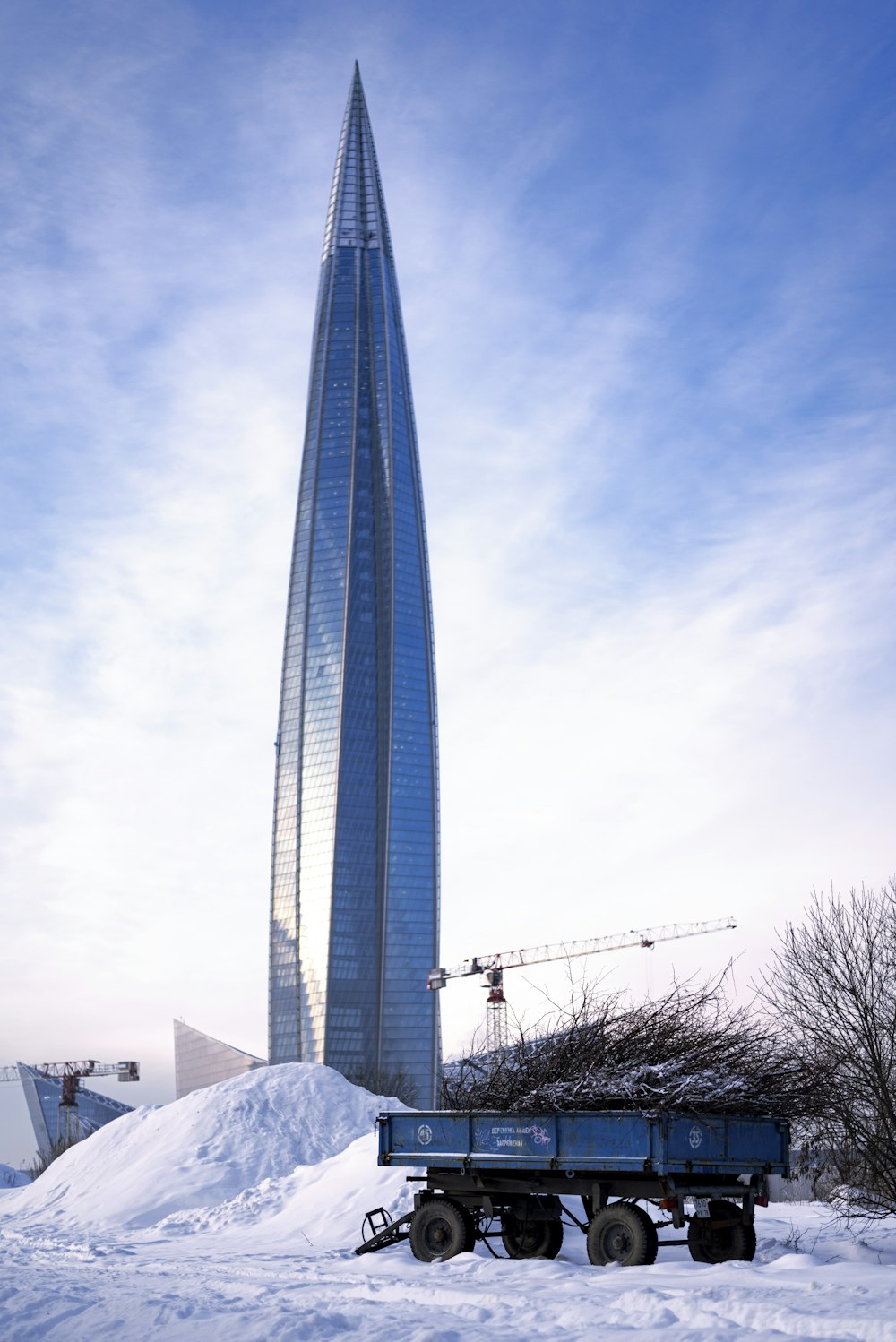 a tall building with a blue sky