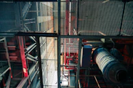 An industrial setting featuring various metal structures produced by the company.