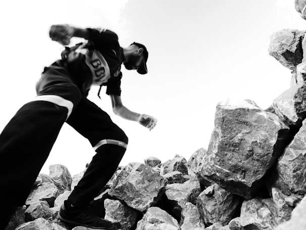 A climber in motion, capturing the thrill of outdoor climbing.