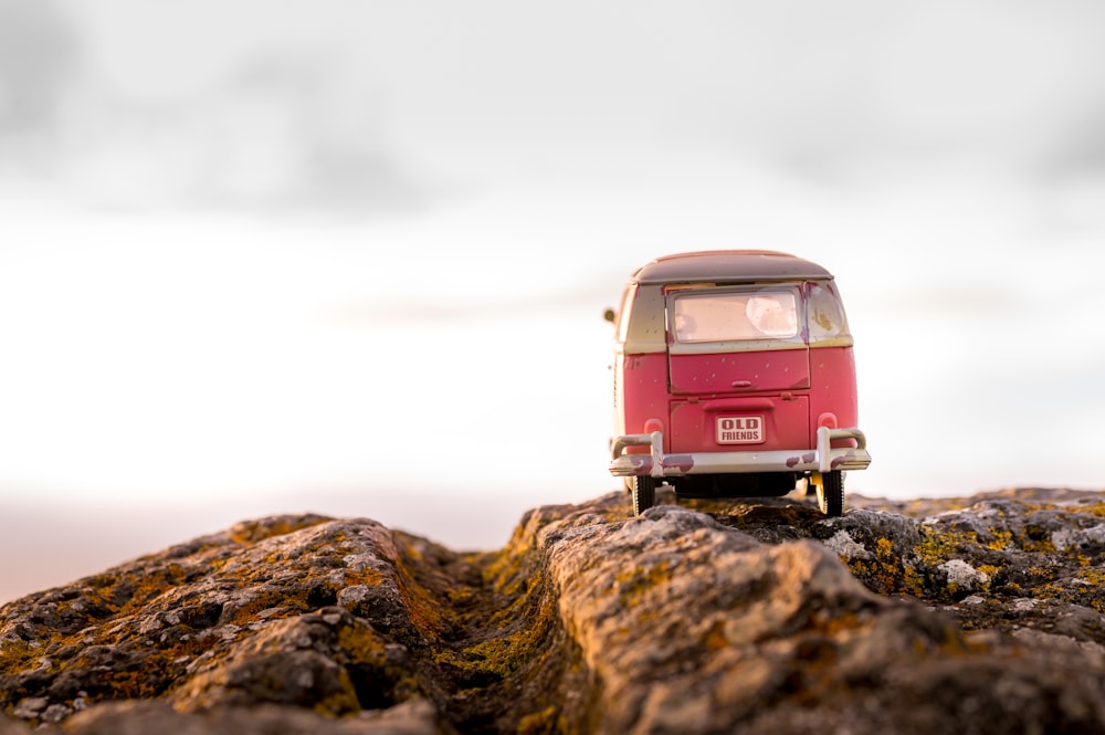 a car parked on a rocky hill