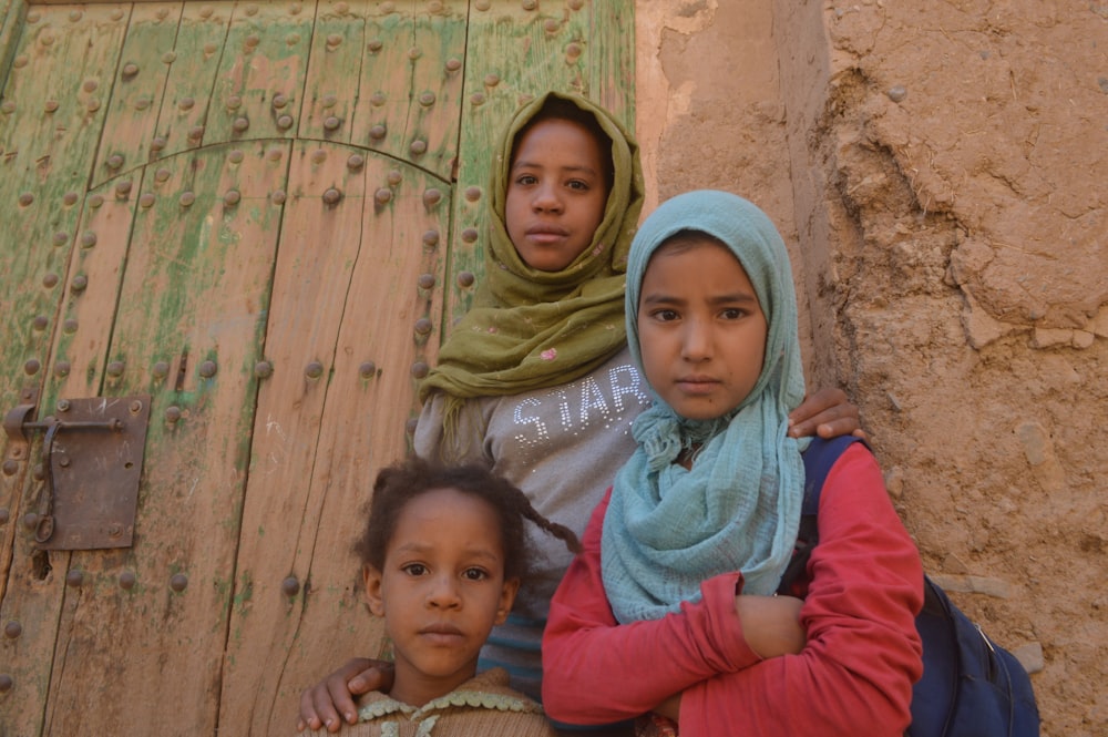 a group of children posing for the camera