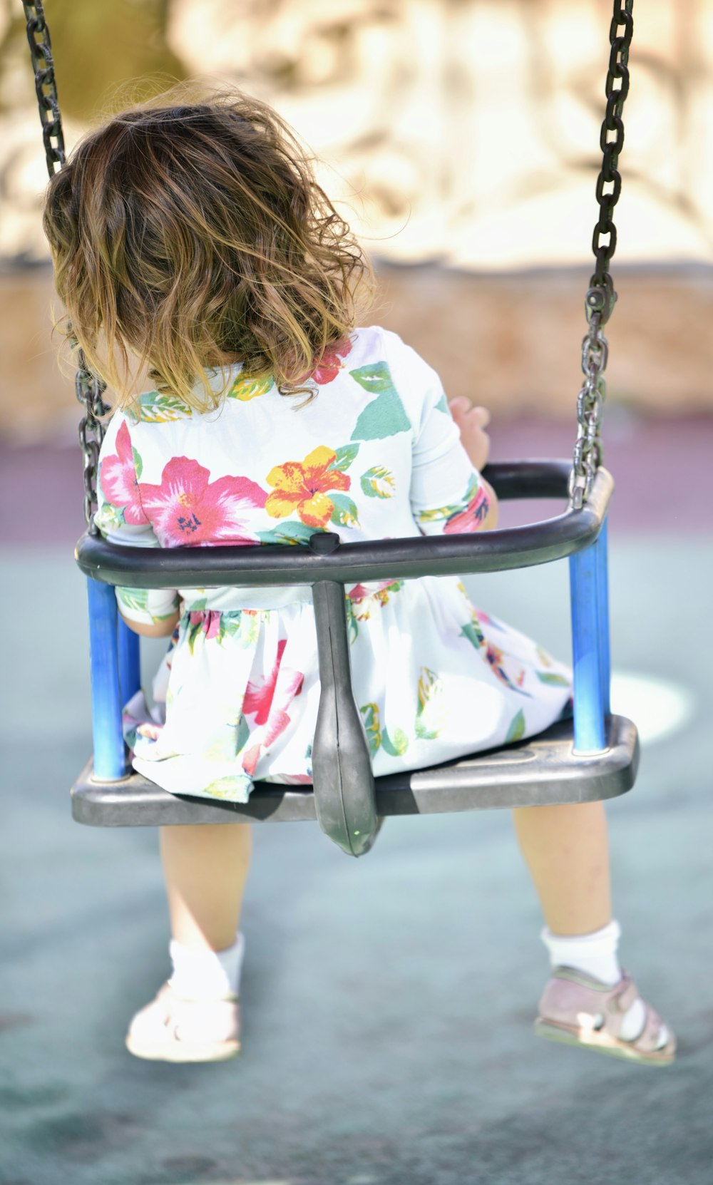 a little girl on a swing