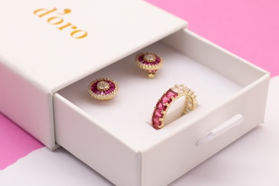 a box with a couple of jewelry
