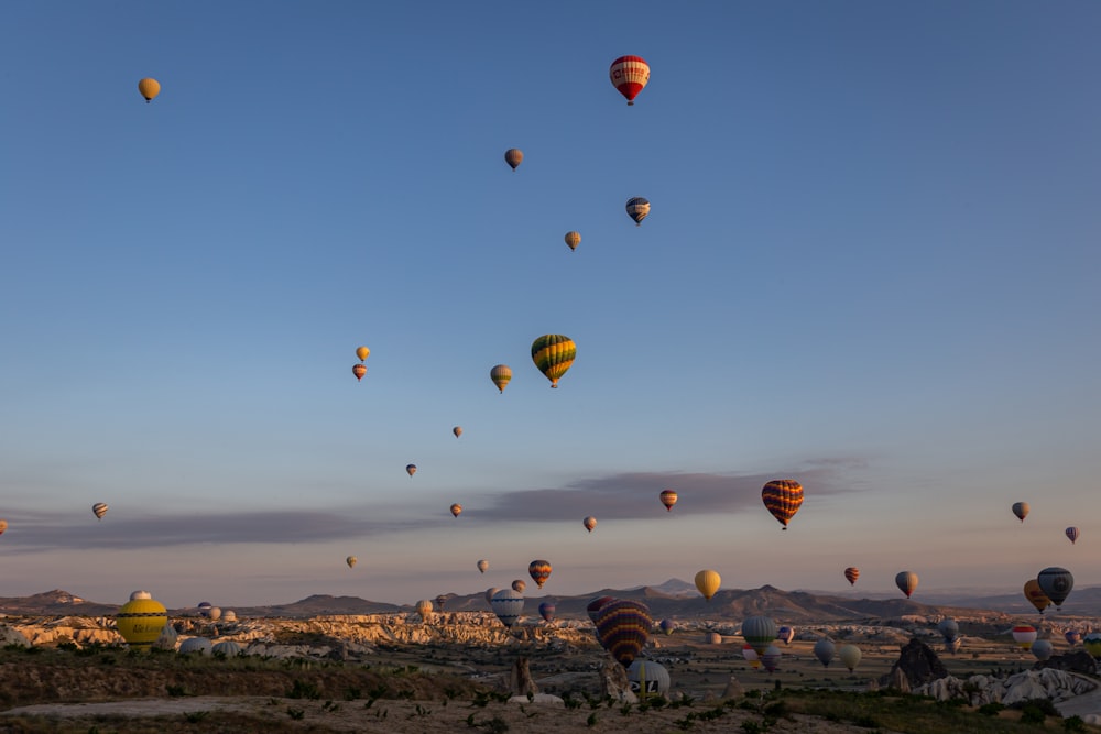 a group of hot air balloons in the sky