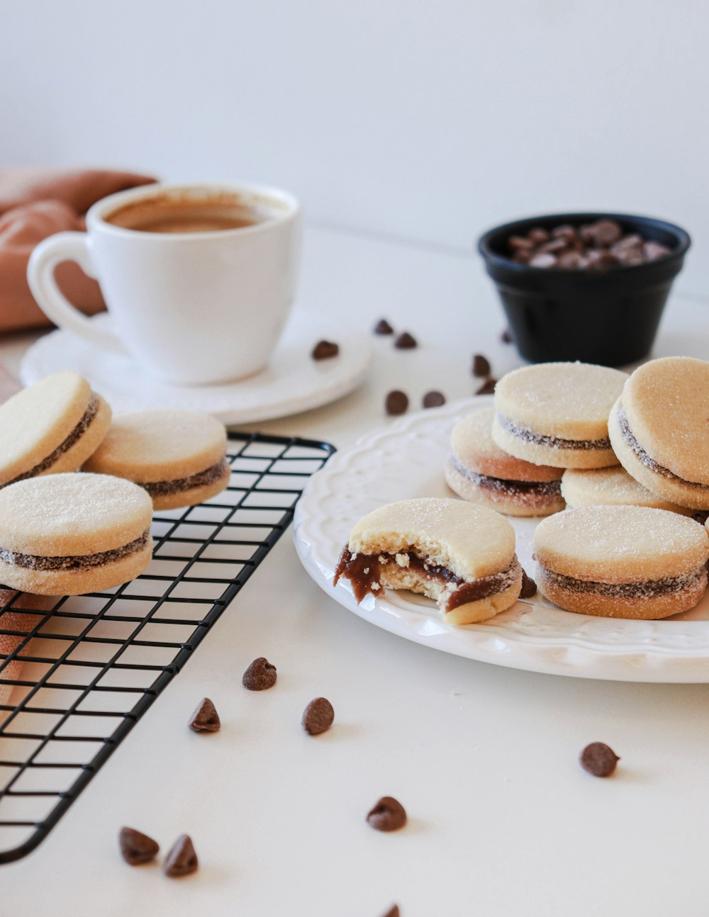 a plate of cookies and coffee