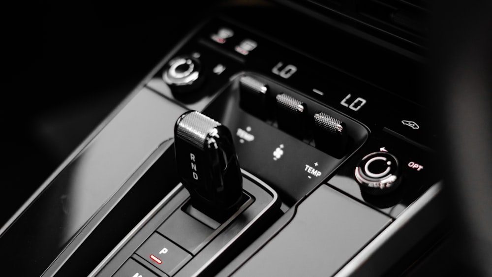 a black and white photo of a car's dashboard