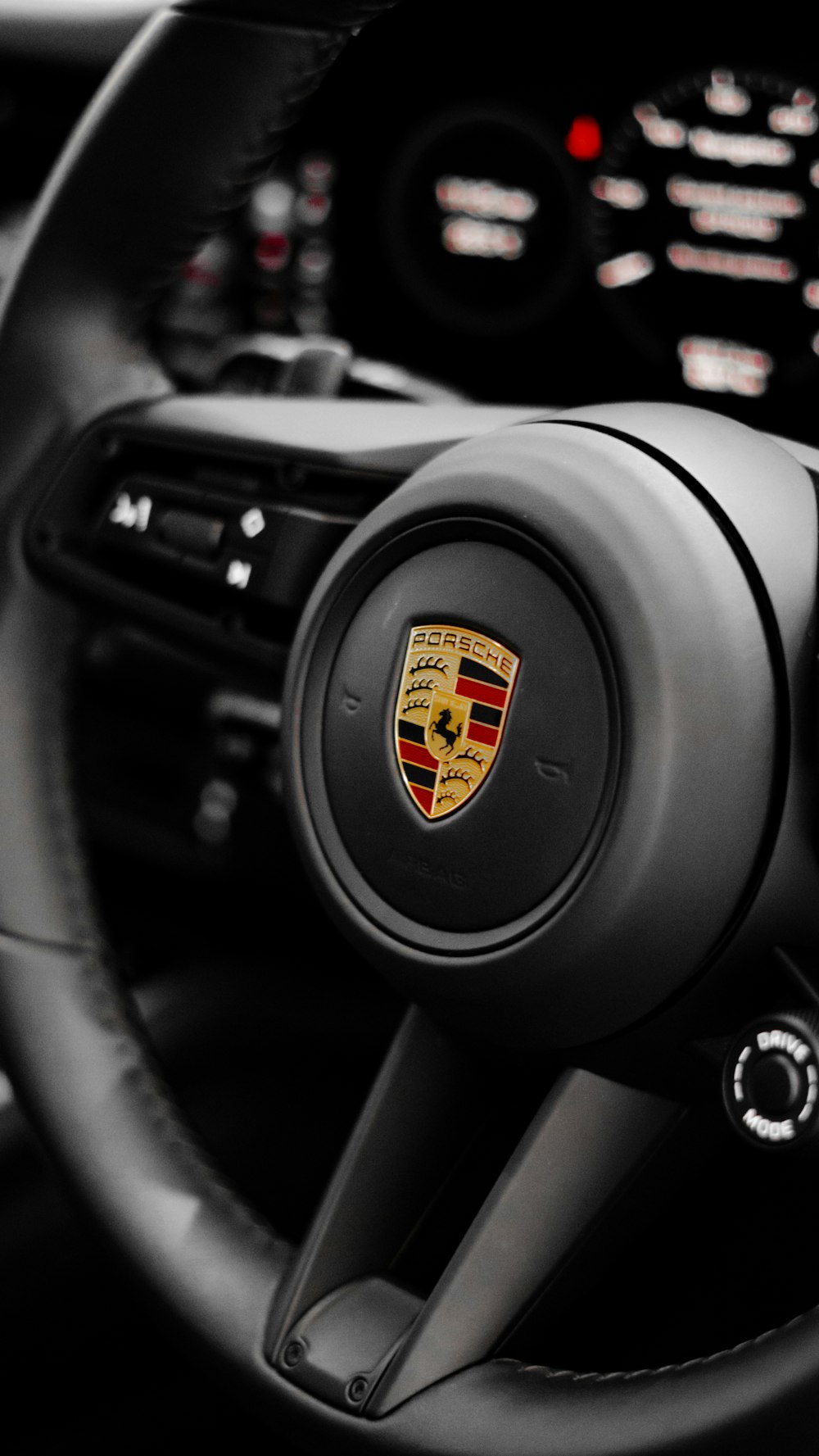 a steering wheel and dashboard of a car