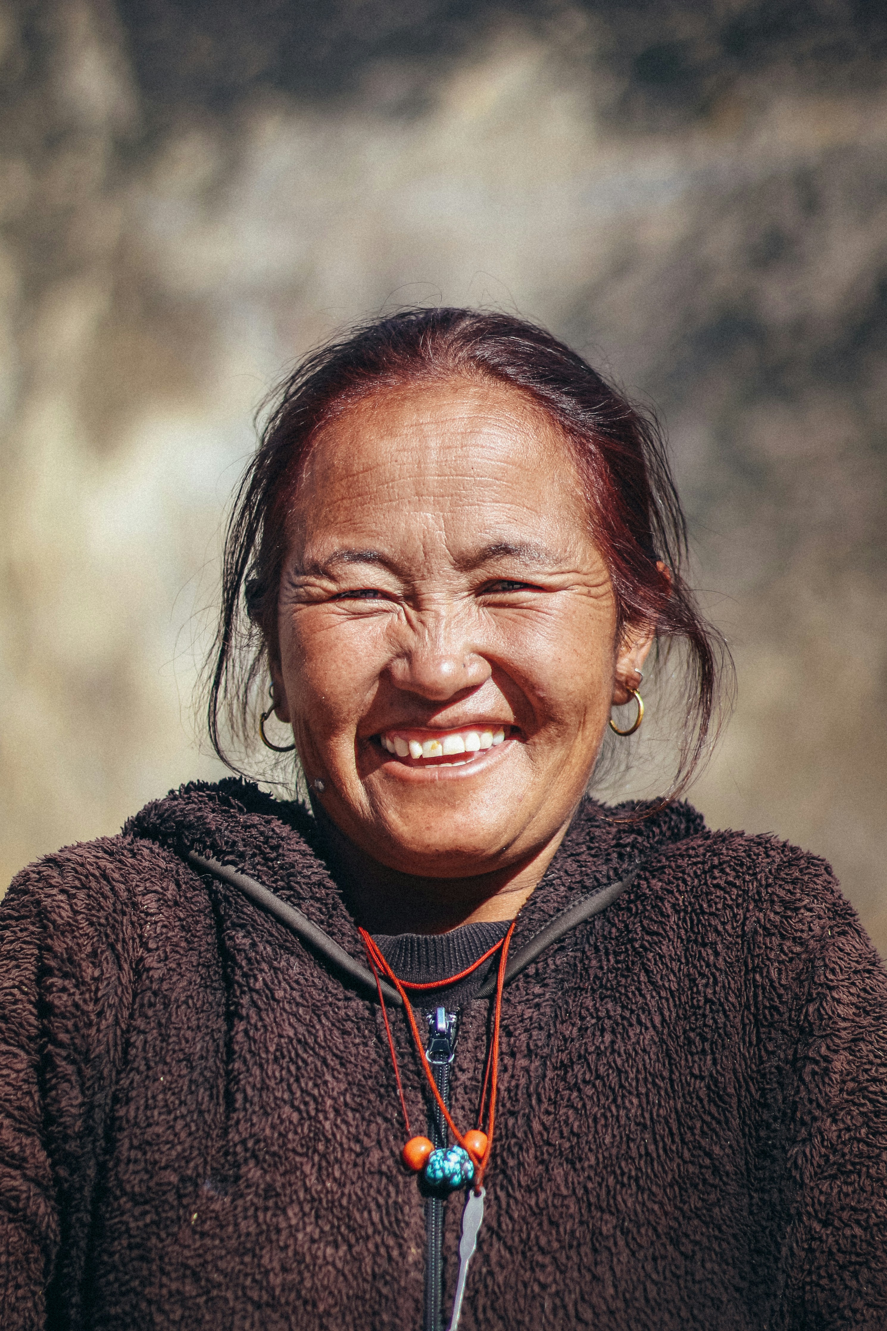 a man smiling with his eyes closed