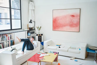 a person lying on a couch