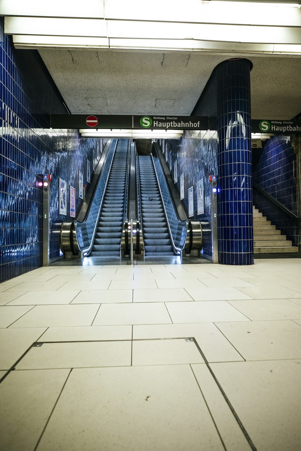 a large escalator in a building