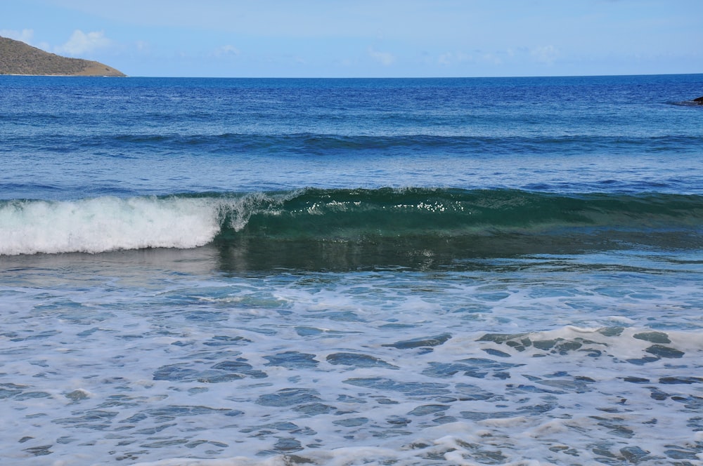 a body of water with waves