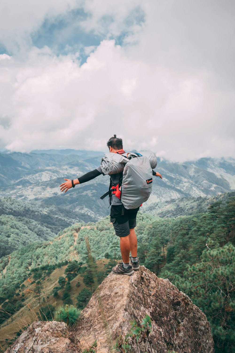 a man standing on a rock