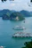 Cruise ships are sailing on tranquil blue-green waters, surrounded by lush green limestone islands. The expansive scene is framed by a bright, cloudy sky and leafy branches in the foreground, creating a peaceful and picturesque maritime landscape.