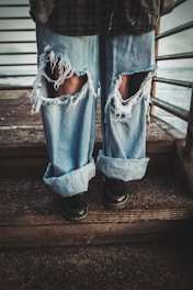 a pair of legs in jeans