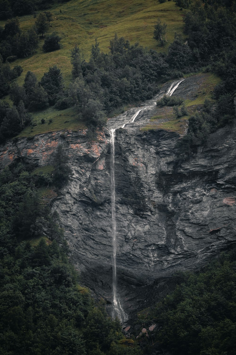 a waterfall in a forest