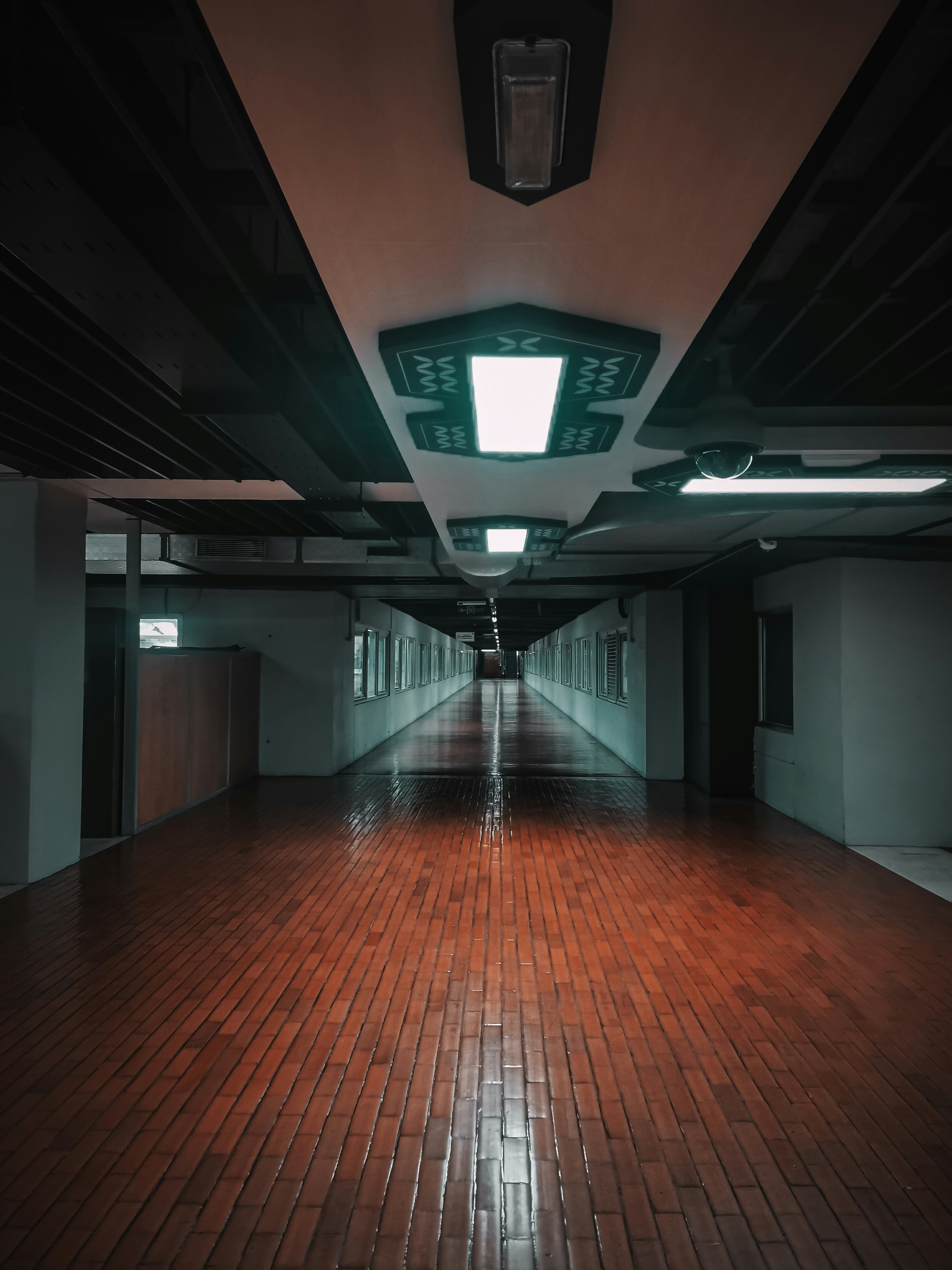 a hallway with a light on the ceiling