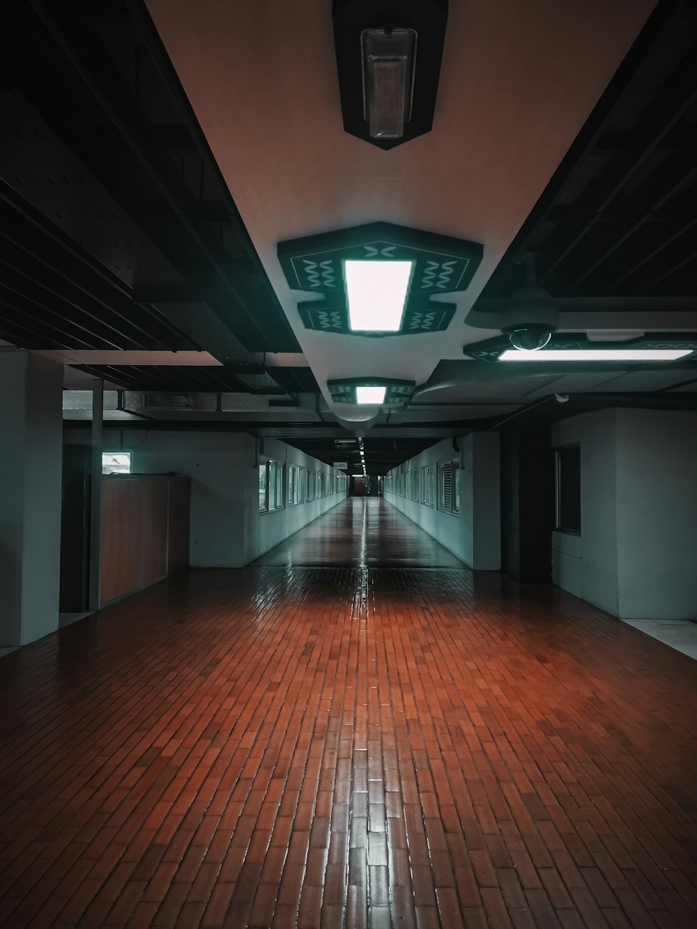 a hallway with a light on the ceiling