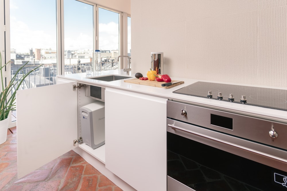 a kitchen with a sink and a window