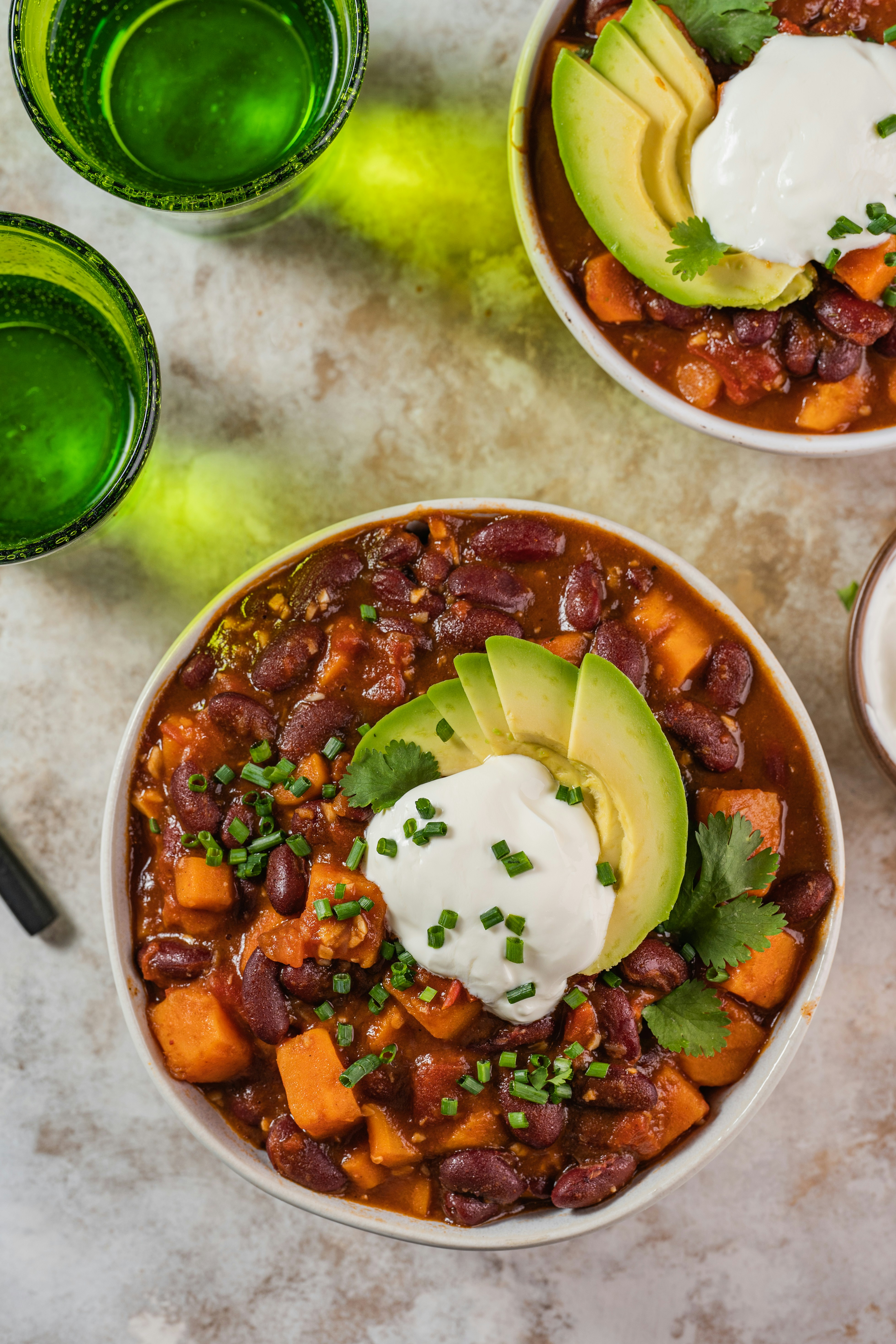 Chili with sweet potato, red beans and avocado