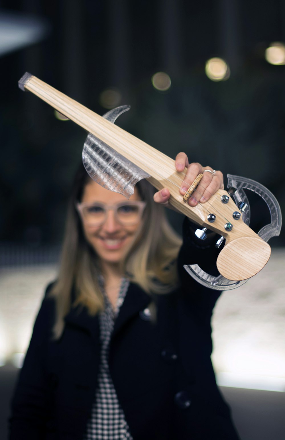 a woman with a guitar