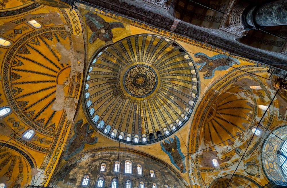 a domed ceiling with many paintings