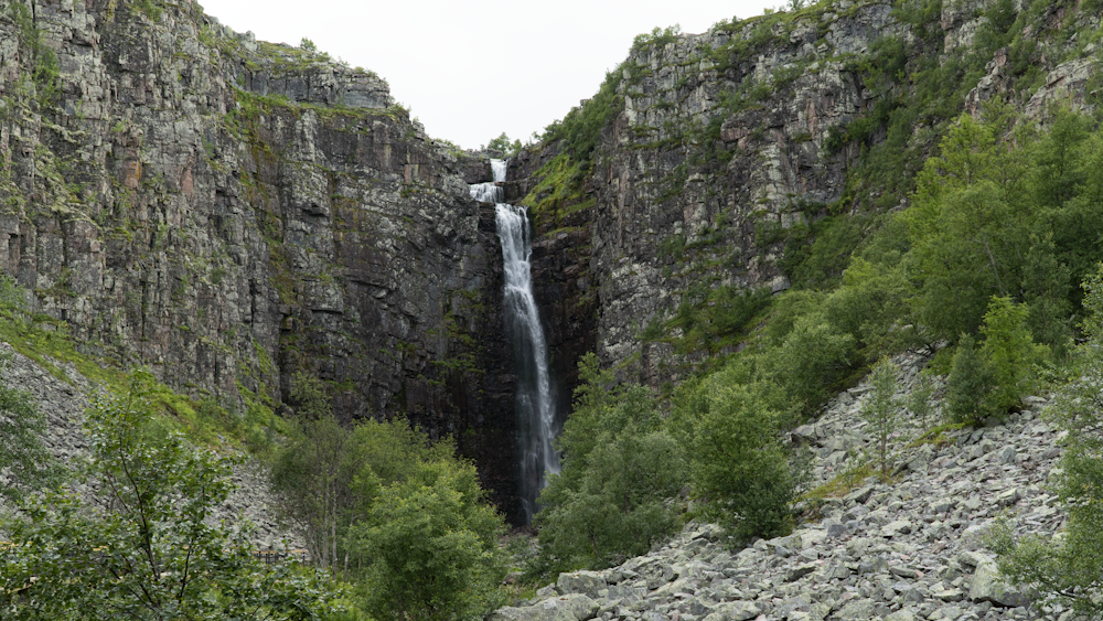 a waterfall in a rocky area