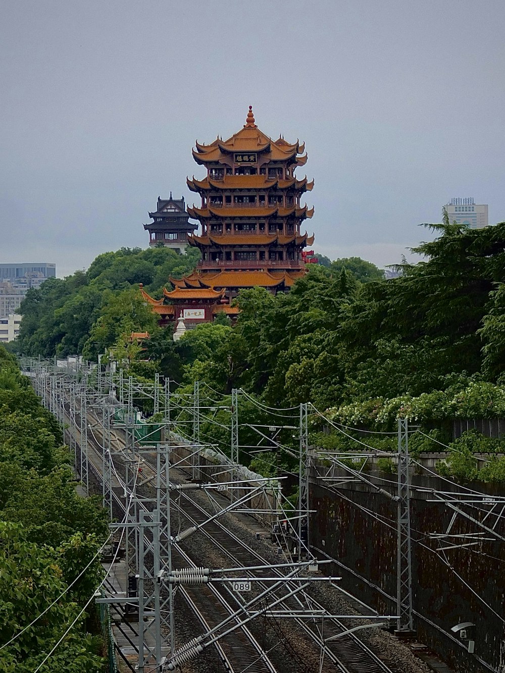 a large pagoda building on a hill