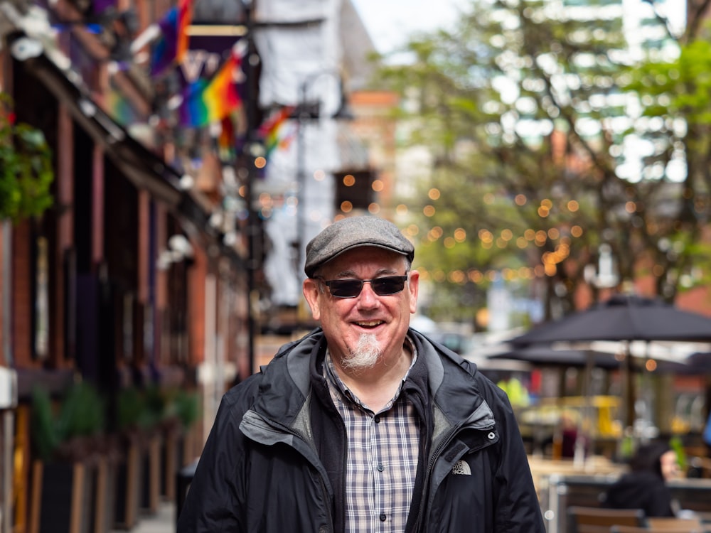 a man wearing sunglasses and a hat