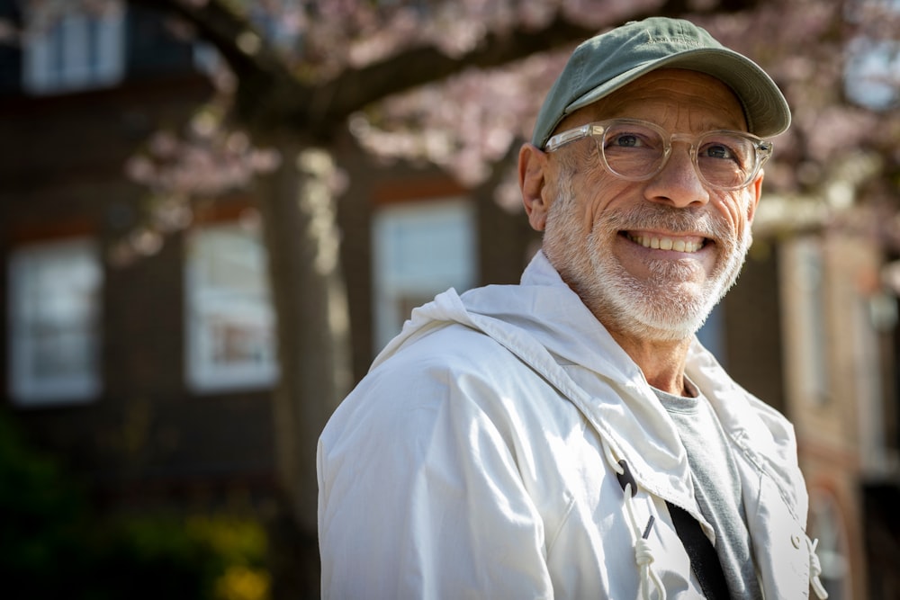 a man wearing a hat and glasses