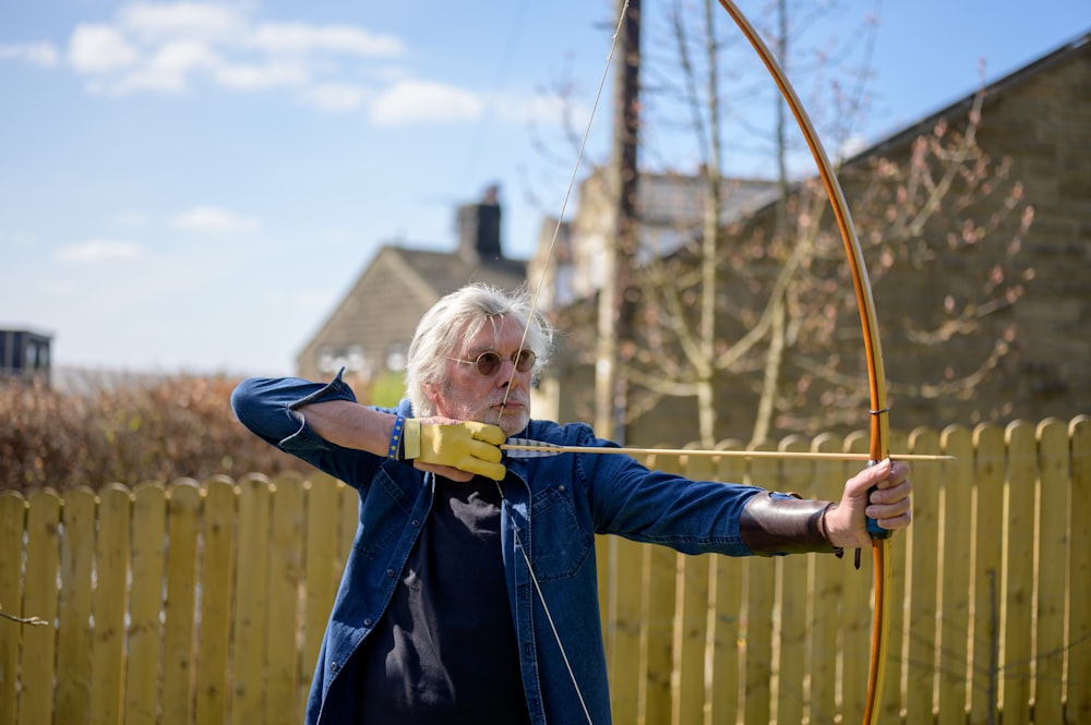 a person holding a bow and arrow