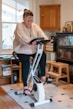 a woman standing on a scooter