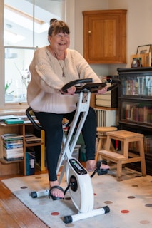 a woman standing on a scooter