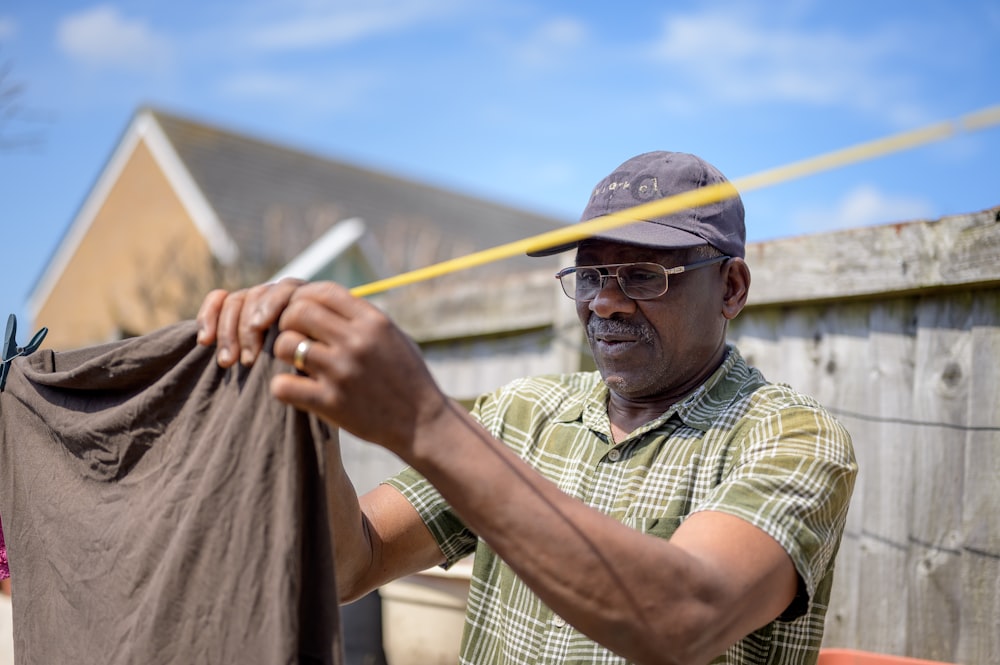 a man holding a pipe