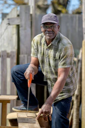 a man holding a hammer