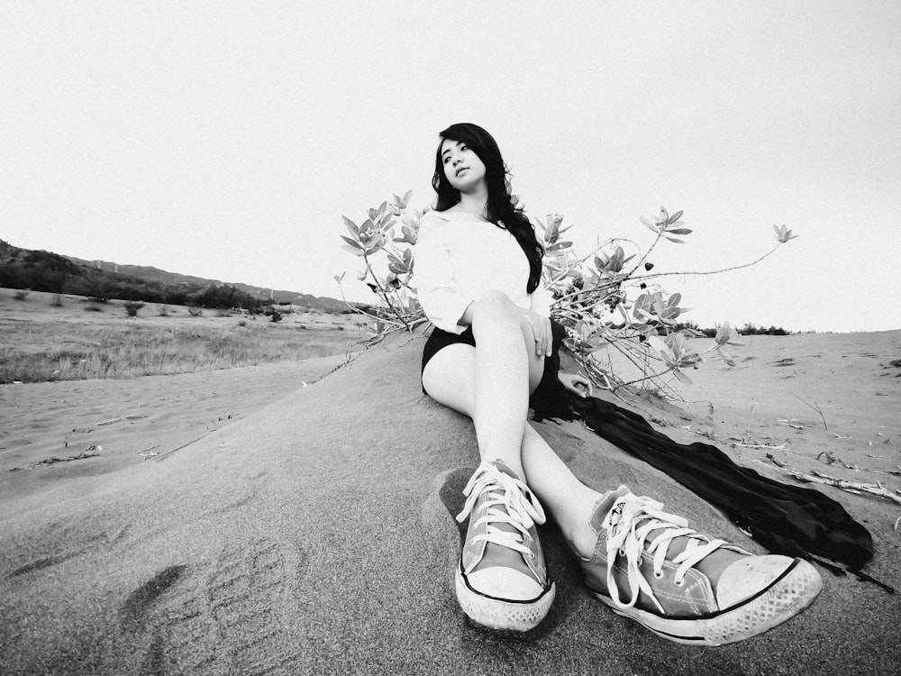 a person sitting on a beach