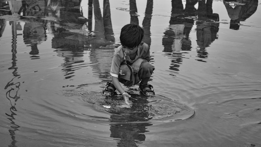a child playing in the water