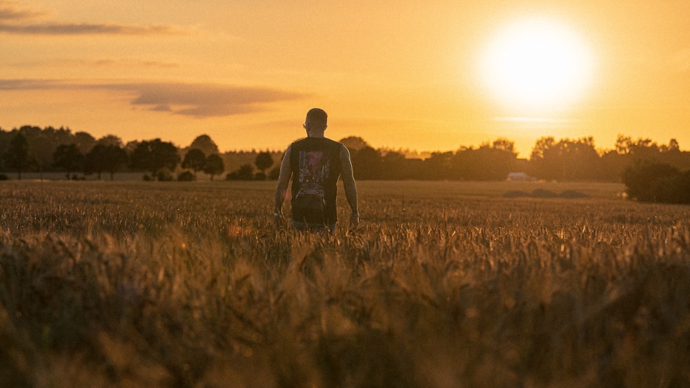 a man standing in a field