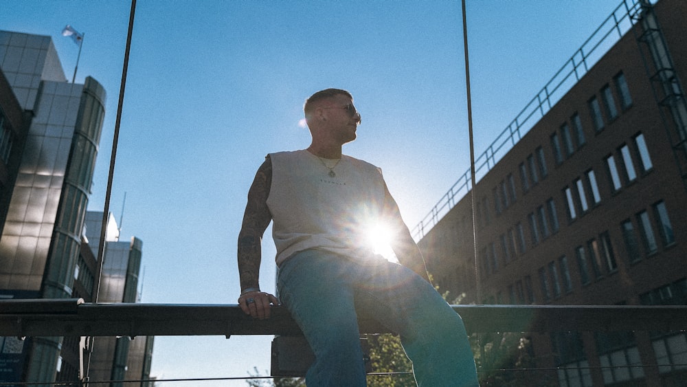 a man standing on a bridge