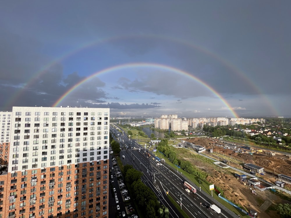 a rainbow over a city